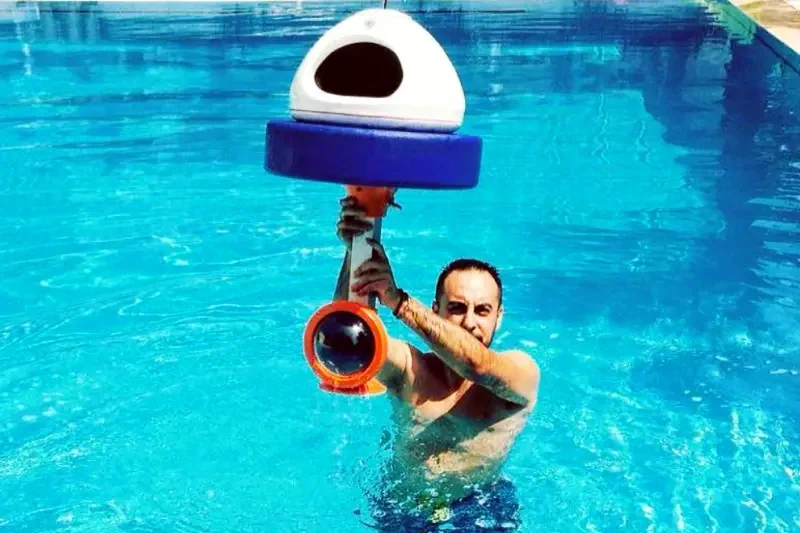 Atilla Baybara testing the patented Aquabooth in a pool